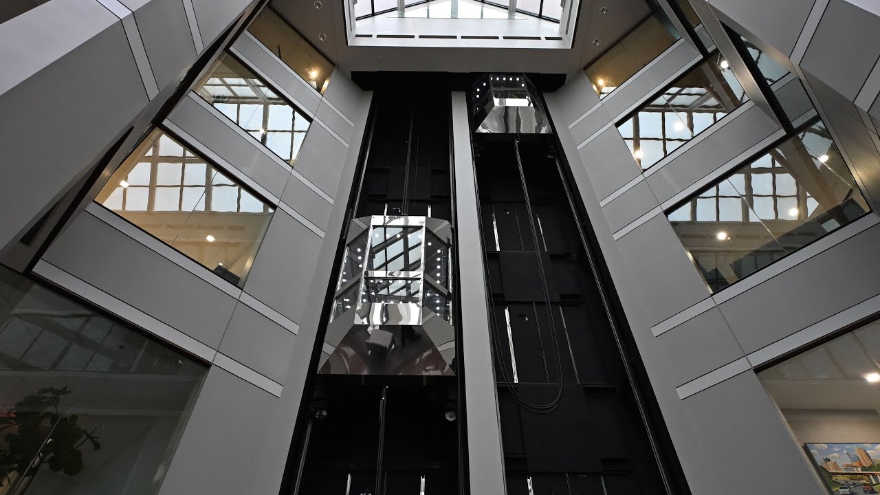 Raleigh, NC Rare buttons on Dover Glass Elevator at Glenwood Plaza