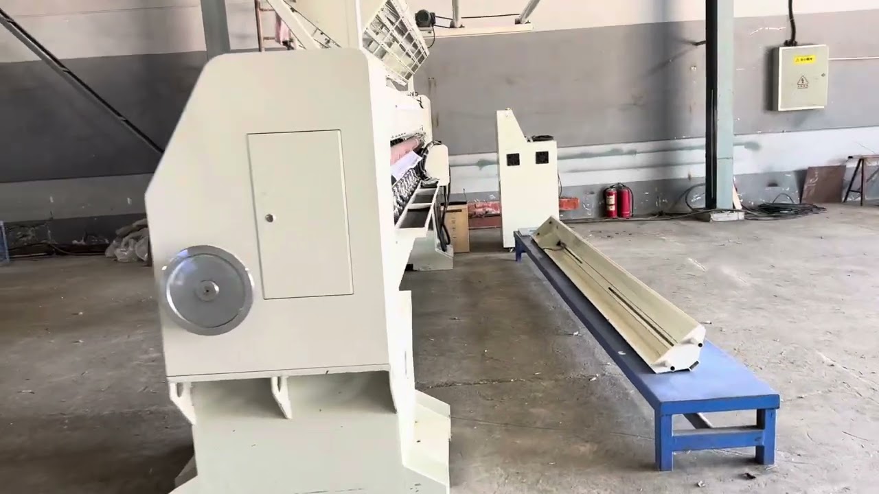 Used computerized multi needle quilting machine 128 inch three bar 10 shutt