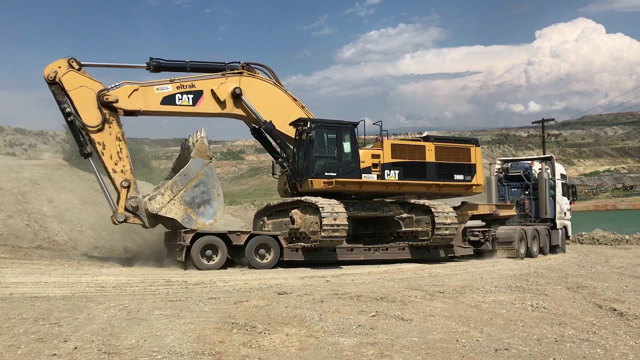 Loading And Transporting By Side The 100 Tones Caterpillar 390D Excavator - Fasoulas HeavyTransports
