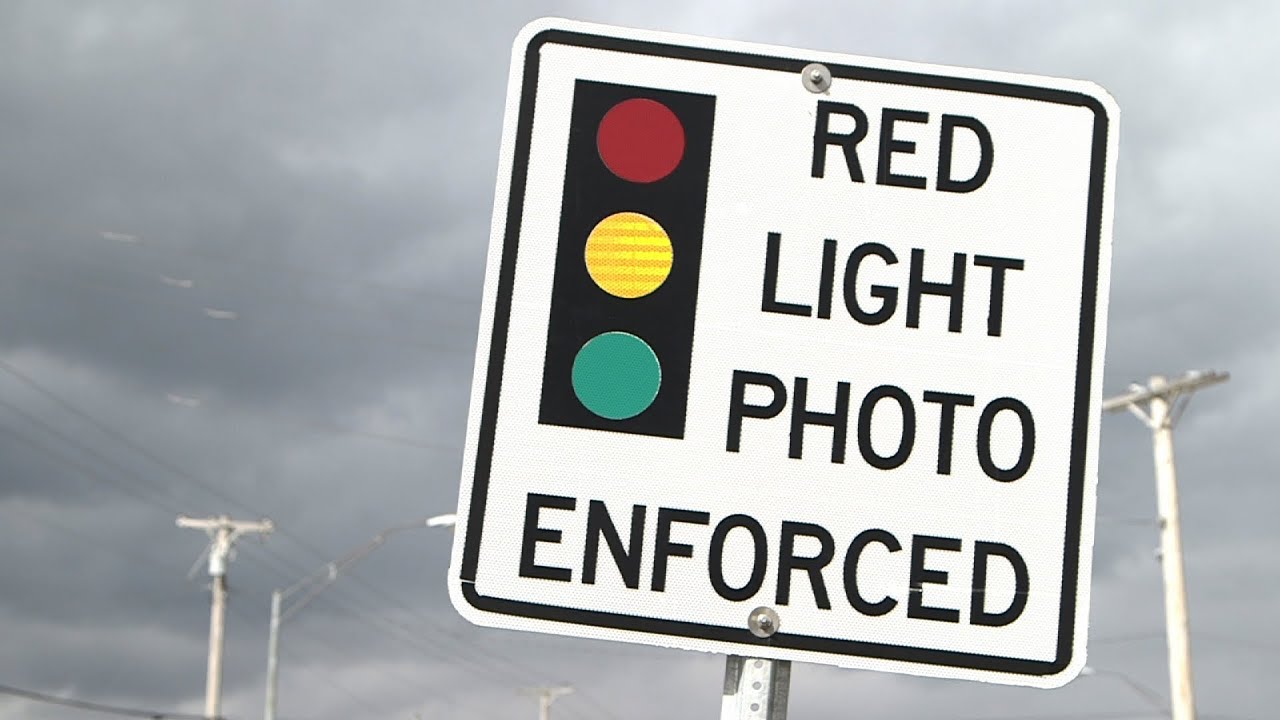Do traffic cameras save lives or violate due process?