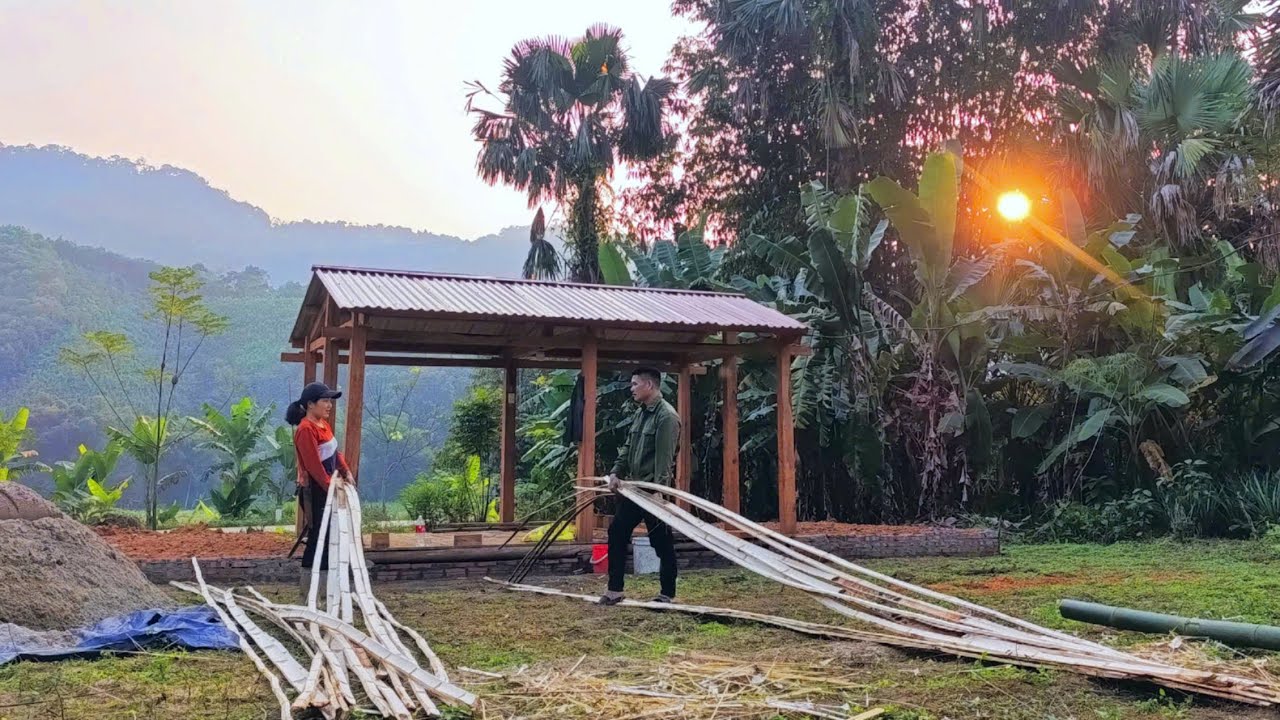 A warm, sunny winter day: Together we gathered bamboo and cassava to prepare for building a fence.