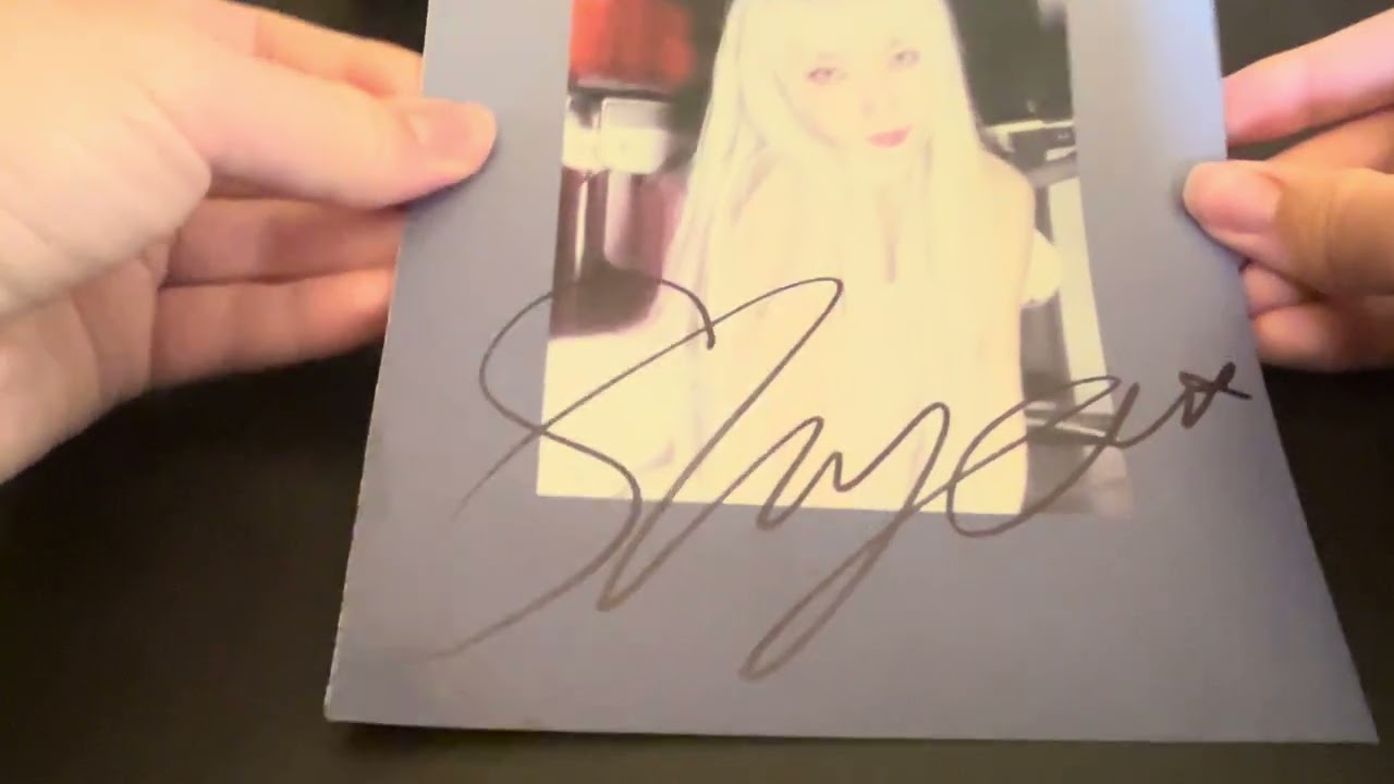 All my signed kpop things that I have gotten so far this year also pola at the end!!