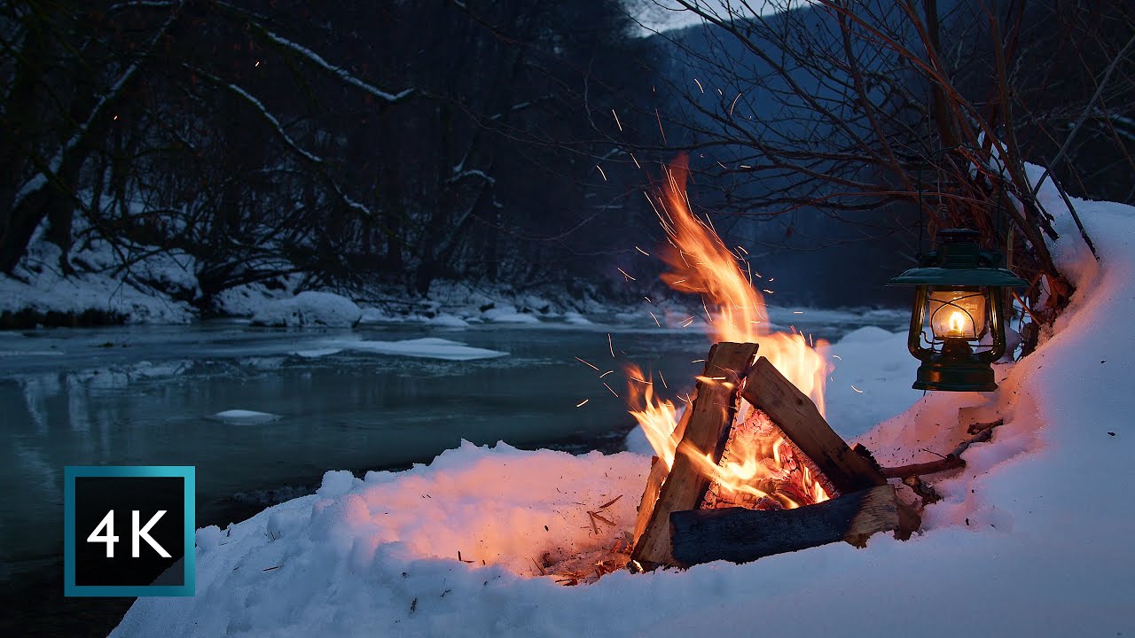 4K Campfire by the melting river on a snowy island, ~32°F (0°C) night ambience — True nature