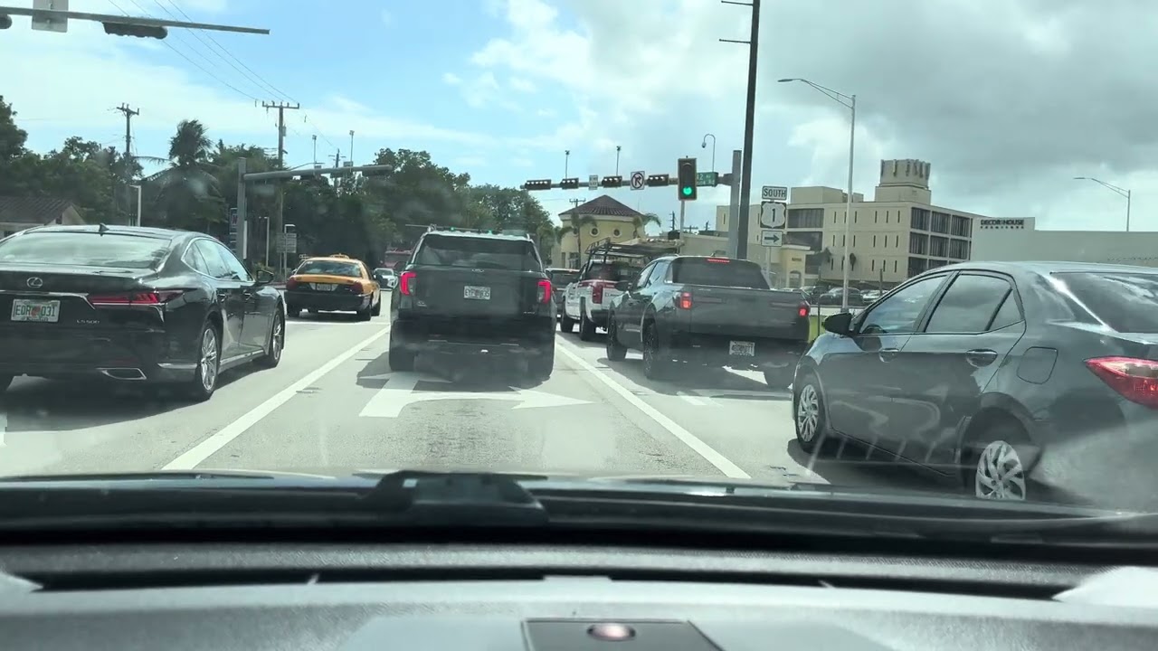 Driving on the streets of Coral Gables, FL neighborhoods including Lejeune Rd and Granada Blvd.