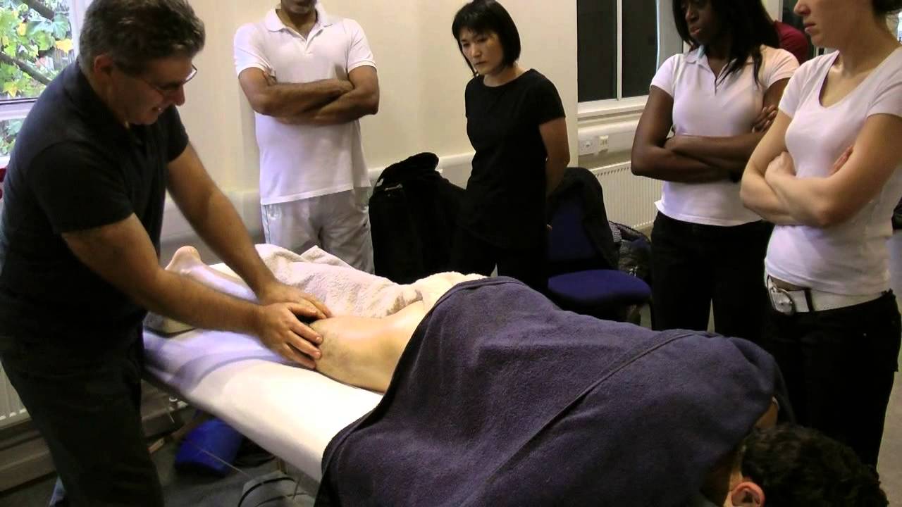 Hot stone massage  lower limb  prone