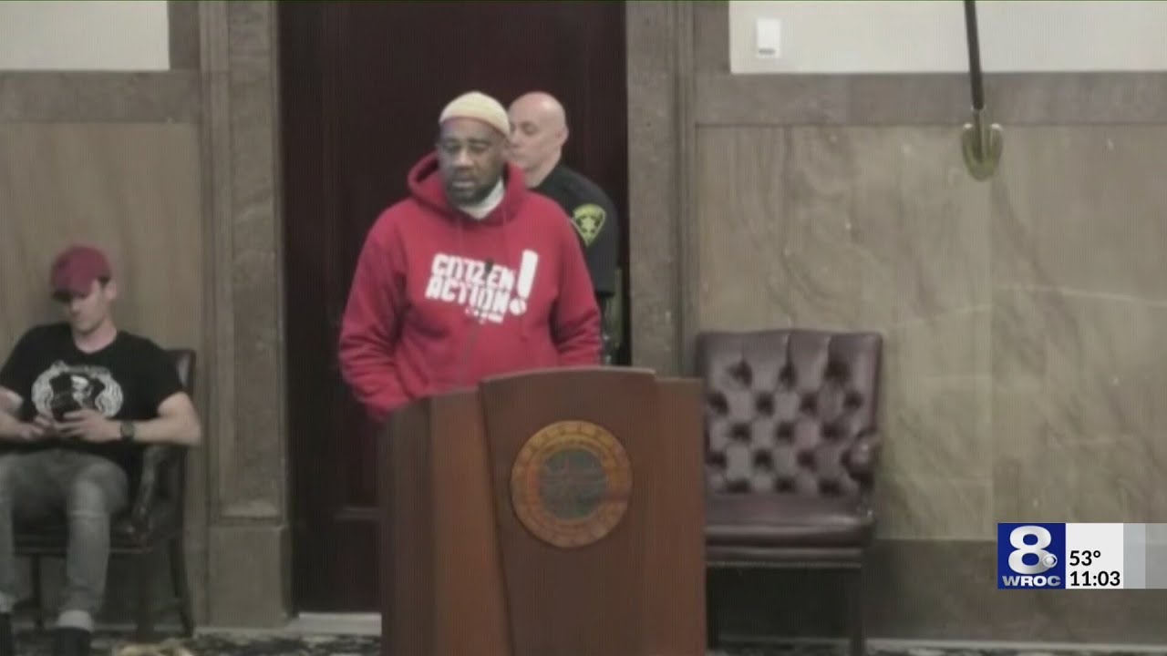 Republican legislators leave chamber during remarks by Jalil Muntaqim at Monroe County meeting