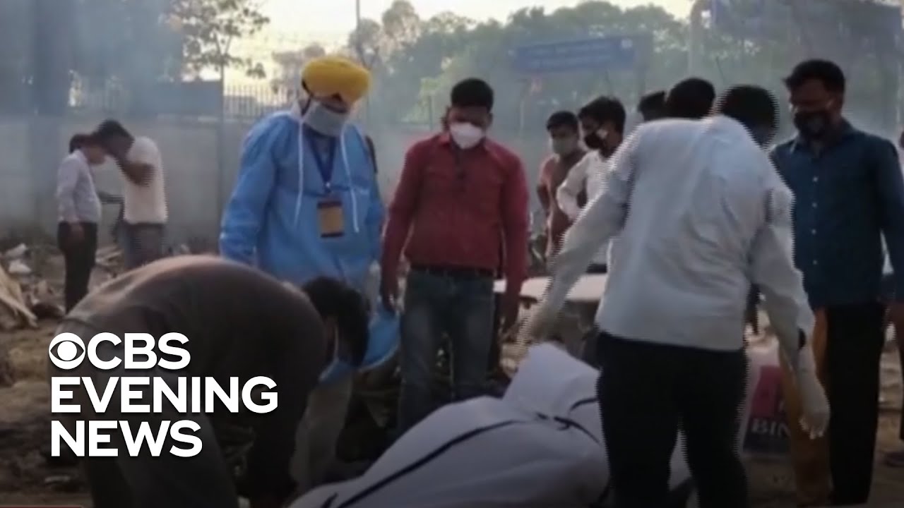 India in crisis as new COVID cases break global record