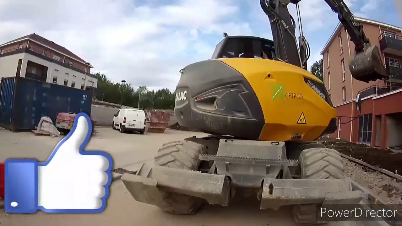 Mettre de la terre végétale mecalac 15 MWR