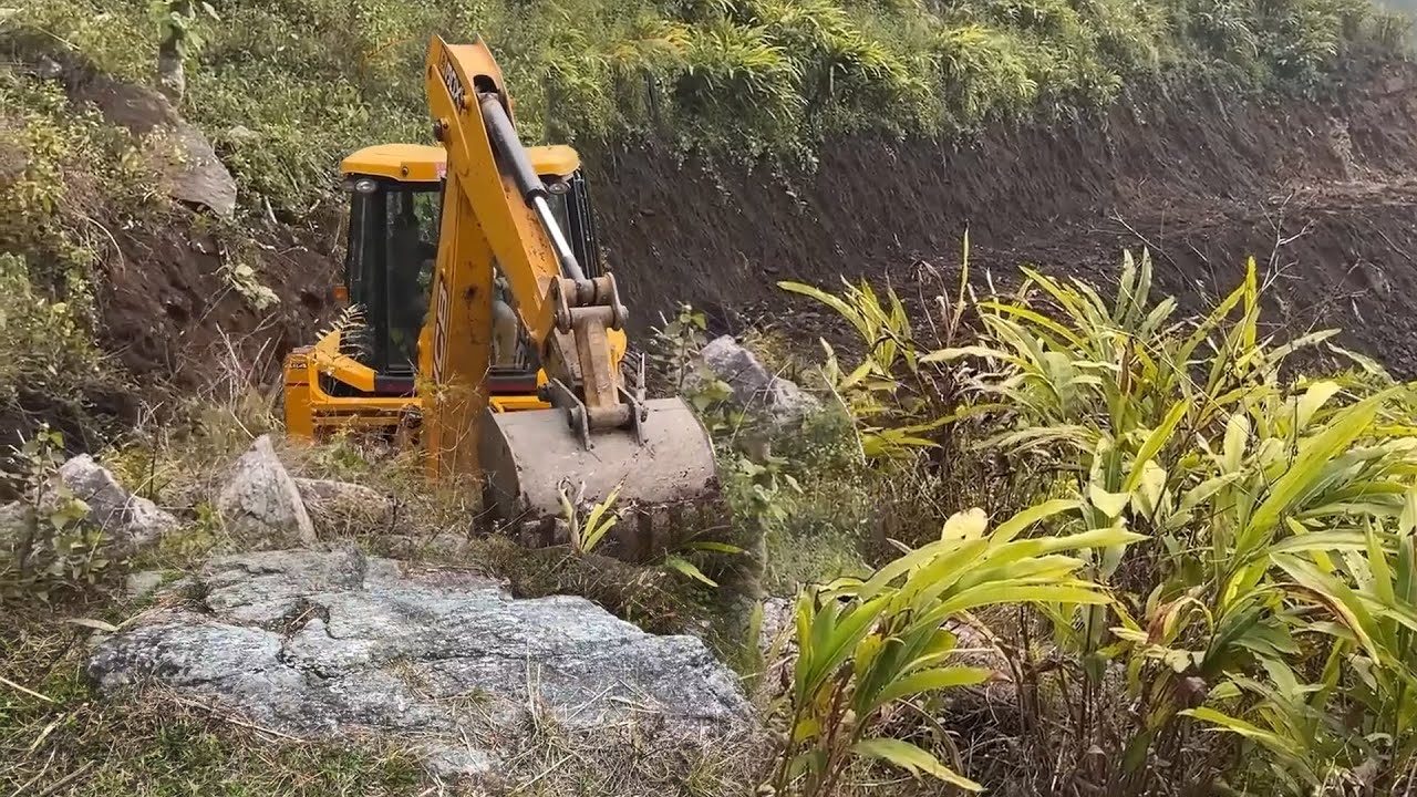 For Village Migration-JCB Excavating Mountain Foot Trail to Drivable Road