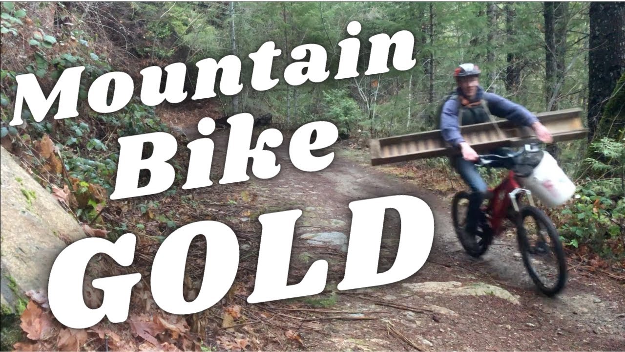 Mountain Bike Gold: mining a new area with the homemade sluice box.