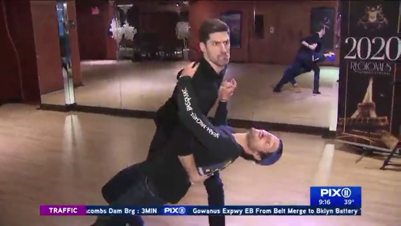 Val Chmerkovskiy teaches Ben Aaron how to dance