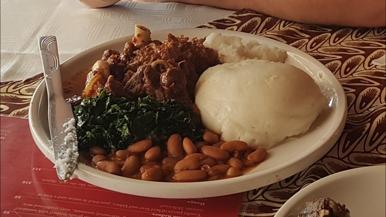 Food in Zimbabwe: sadza roadrunner peanut butter rice brai biltong chicken inn nando's fruit potjie