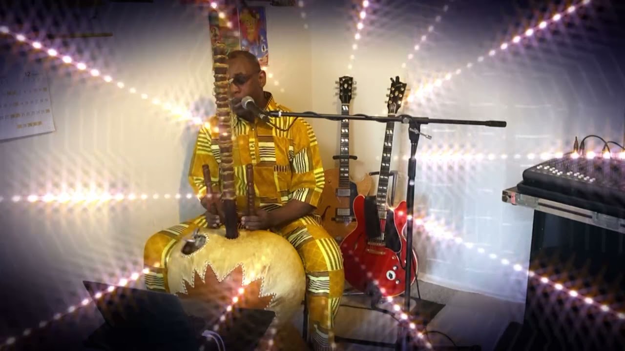 Kaira with guitar and Kora