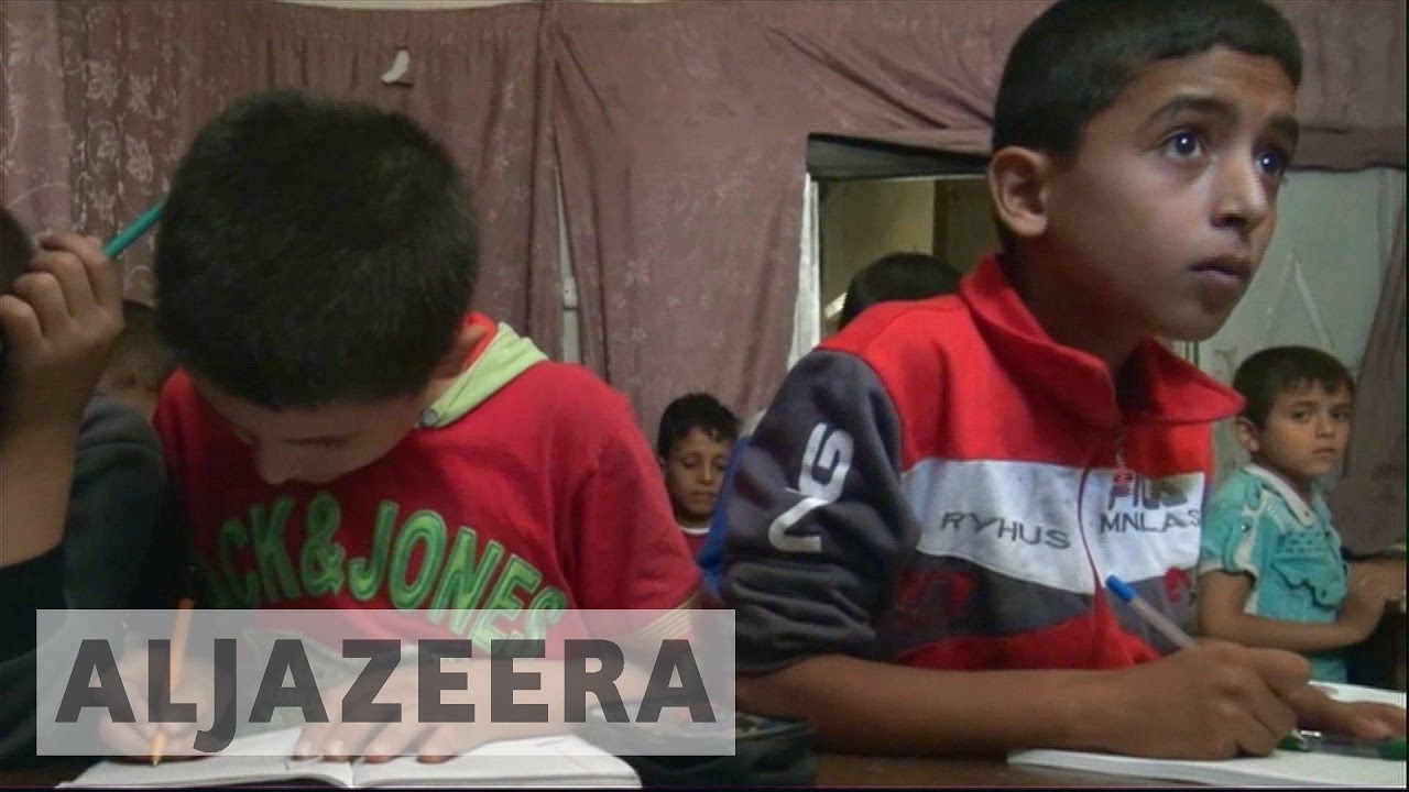 Children attend underground school in Syria&rsquo;s Aleppo