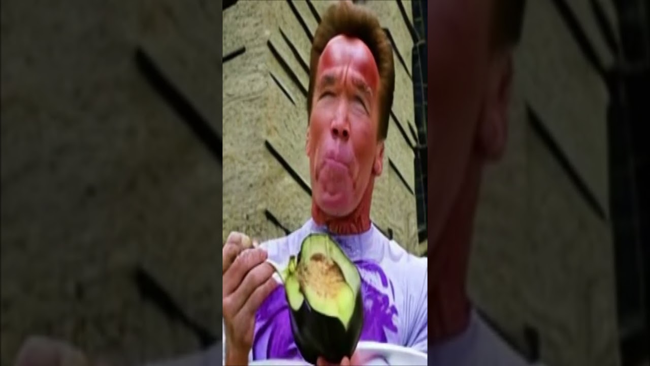 Arnold Schwarzenegger eating eggplant