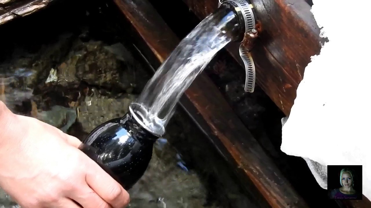 Collecting water from King Spring, in the Maine woods!