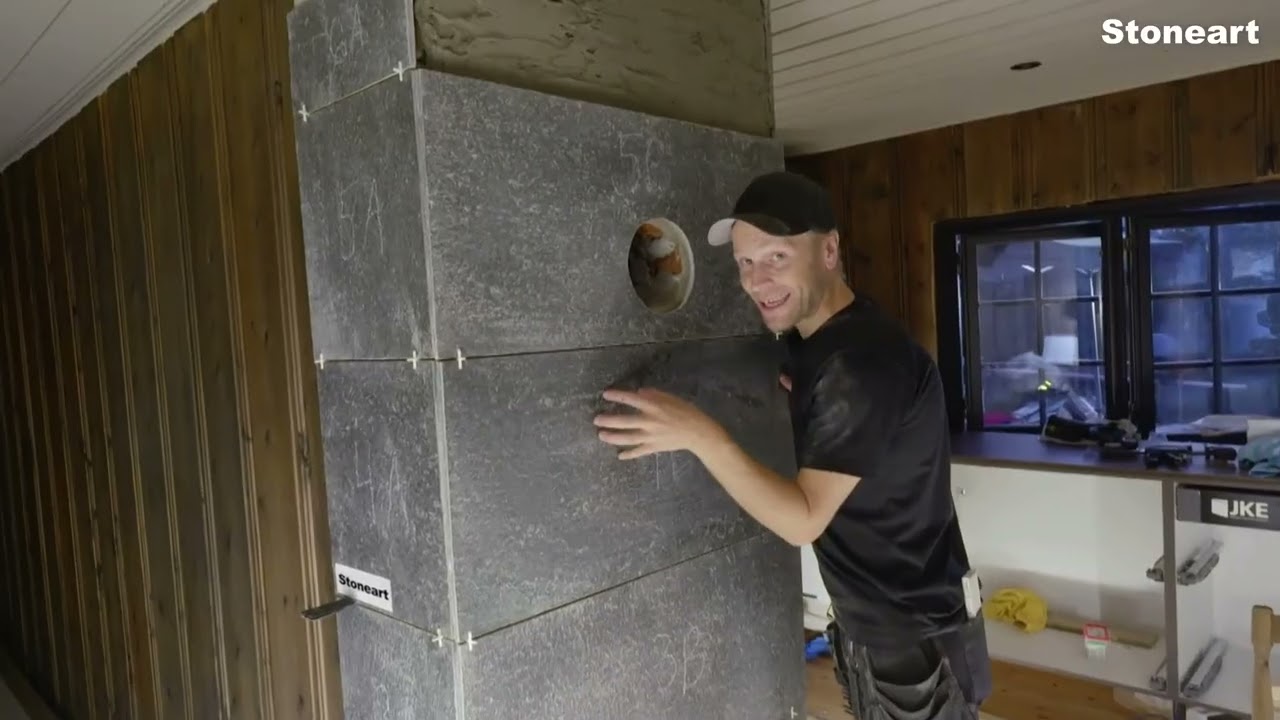 Eventyrlig Oppussing Femundsundet - Ny brannmur og peisplate i Mørk Oppdal skifer