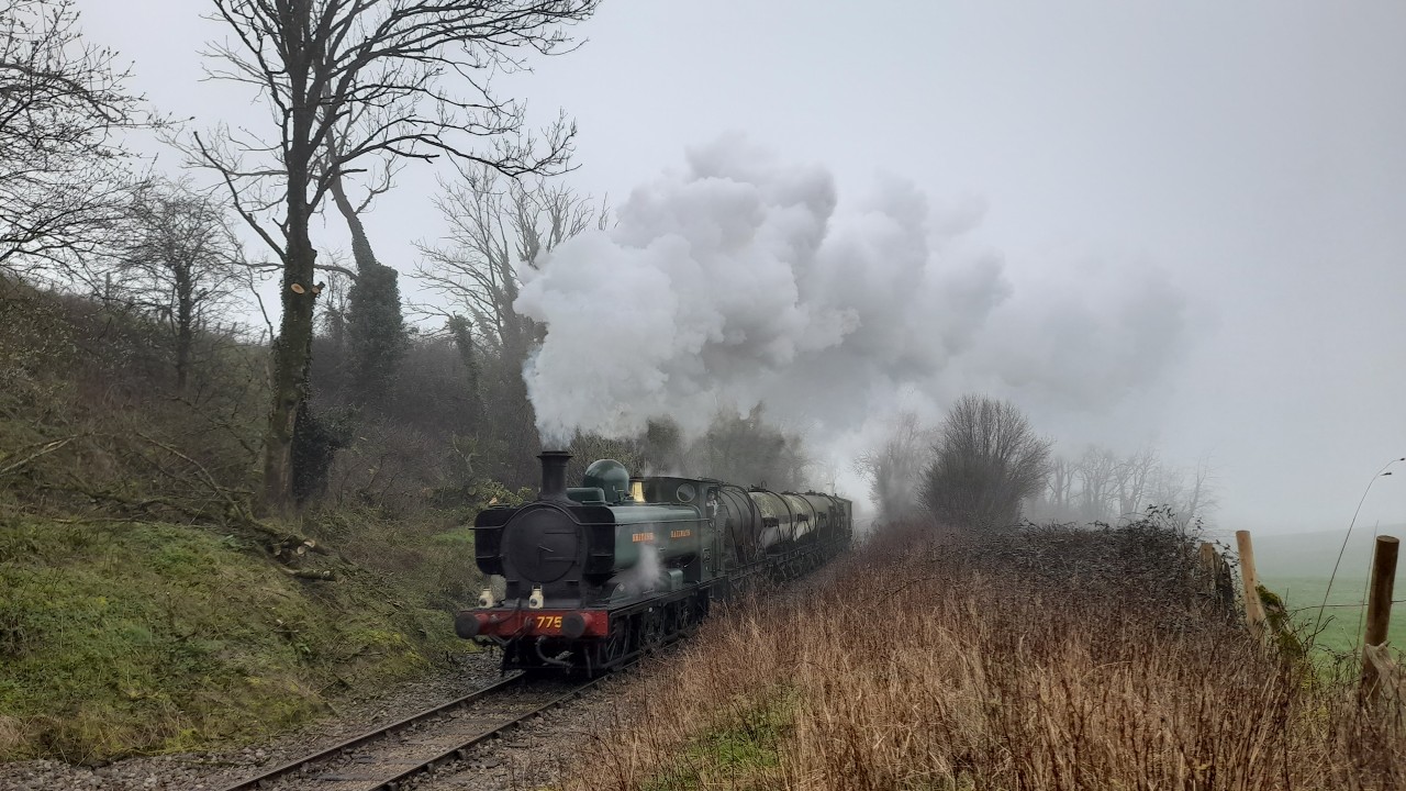 The East Somerset Railway 7754 on the Milk tanks ( 30742 Charters )
