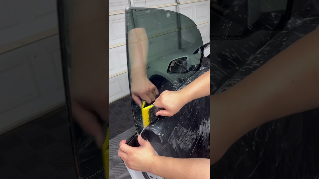 Installing nano ceramic window tint to a model Y juniper front window in 1 minute! Zero gap finish