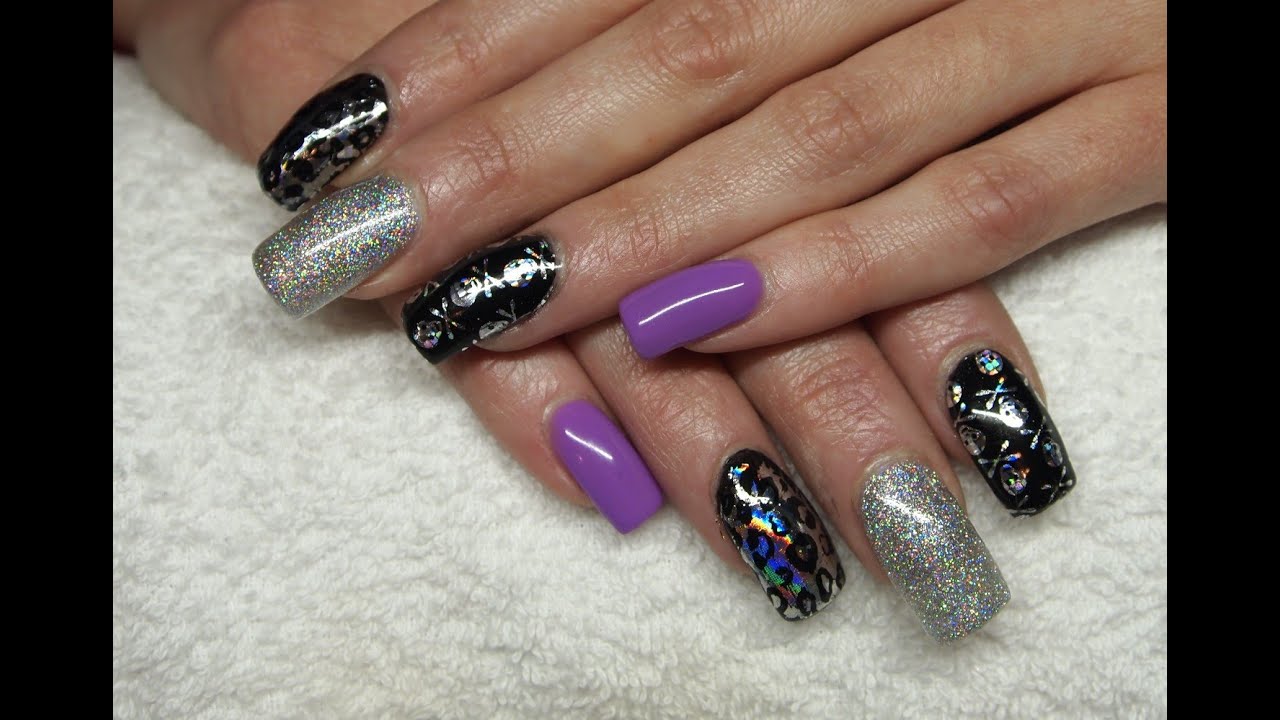 Skull & Leopard Print Foils with gel polish application on acrylic nails