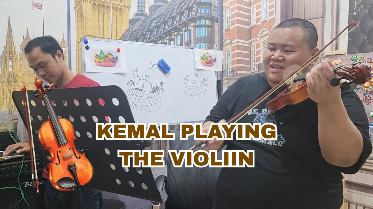 Kemal Playing The Violin