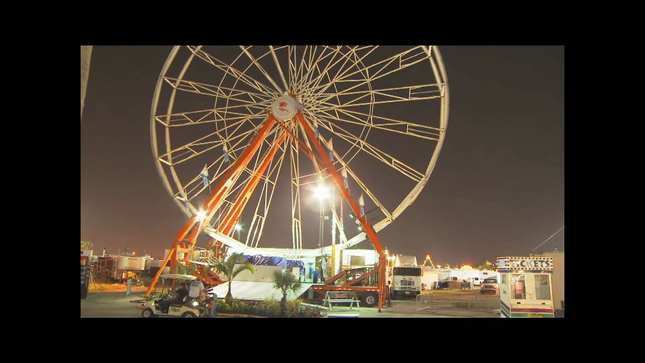 HD Time Lapsed Transforming Ferris Wheel -  Carnival Rides - HD Stock Footage