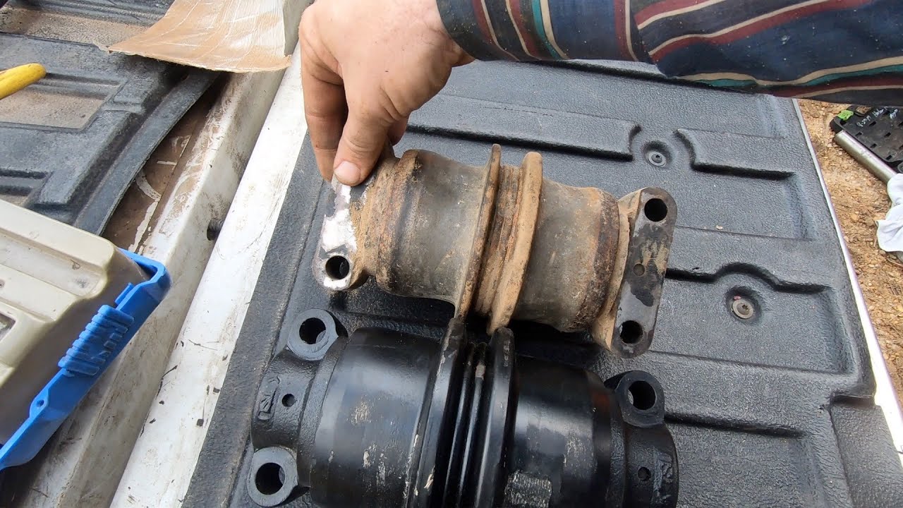 Changing Bottom Roller On Kubota KX080