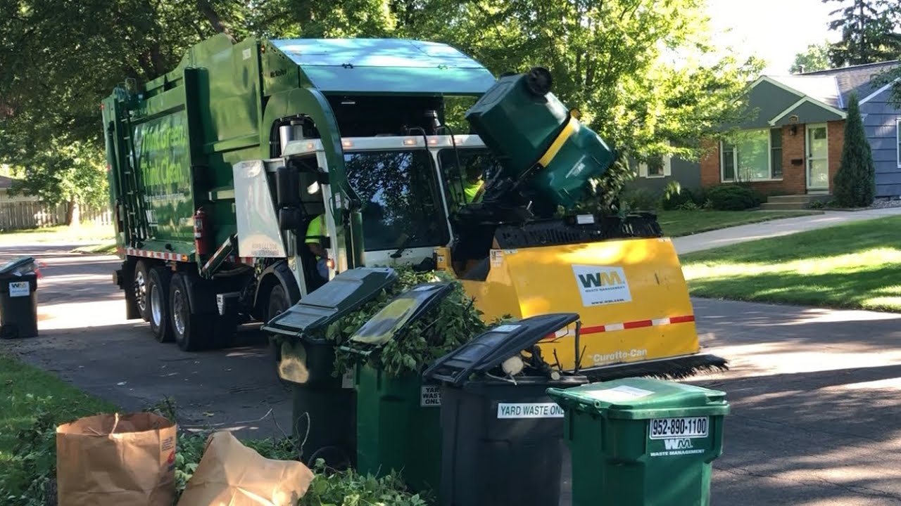 Waste Management Garbage Truck vs. Big Yard Waste Line