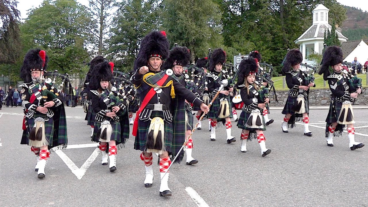 The Lonach Pipe Band play 'H.L.I Crossing the Rhine' marching to the 2019 Braemar Gathering