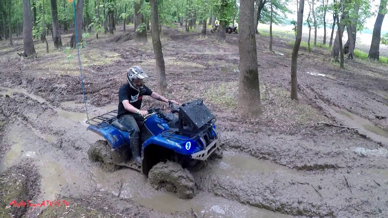 Grizzly 660 and Renegade 1000 playing in a little mud.