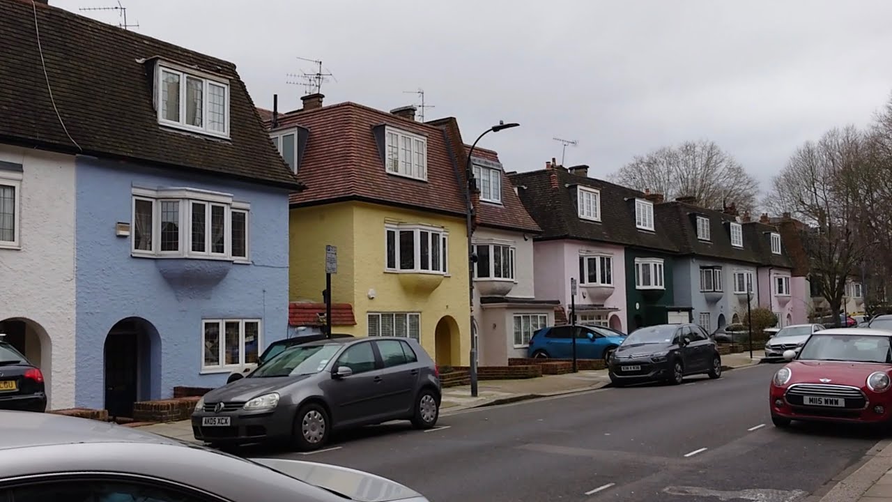 walk from Baron's Court residential to Hammersmith Station, heading to Heathrow Airport with baggage