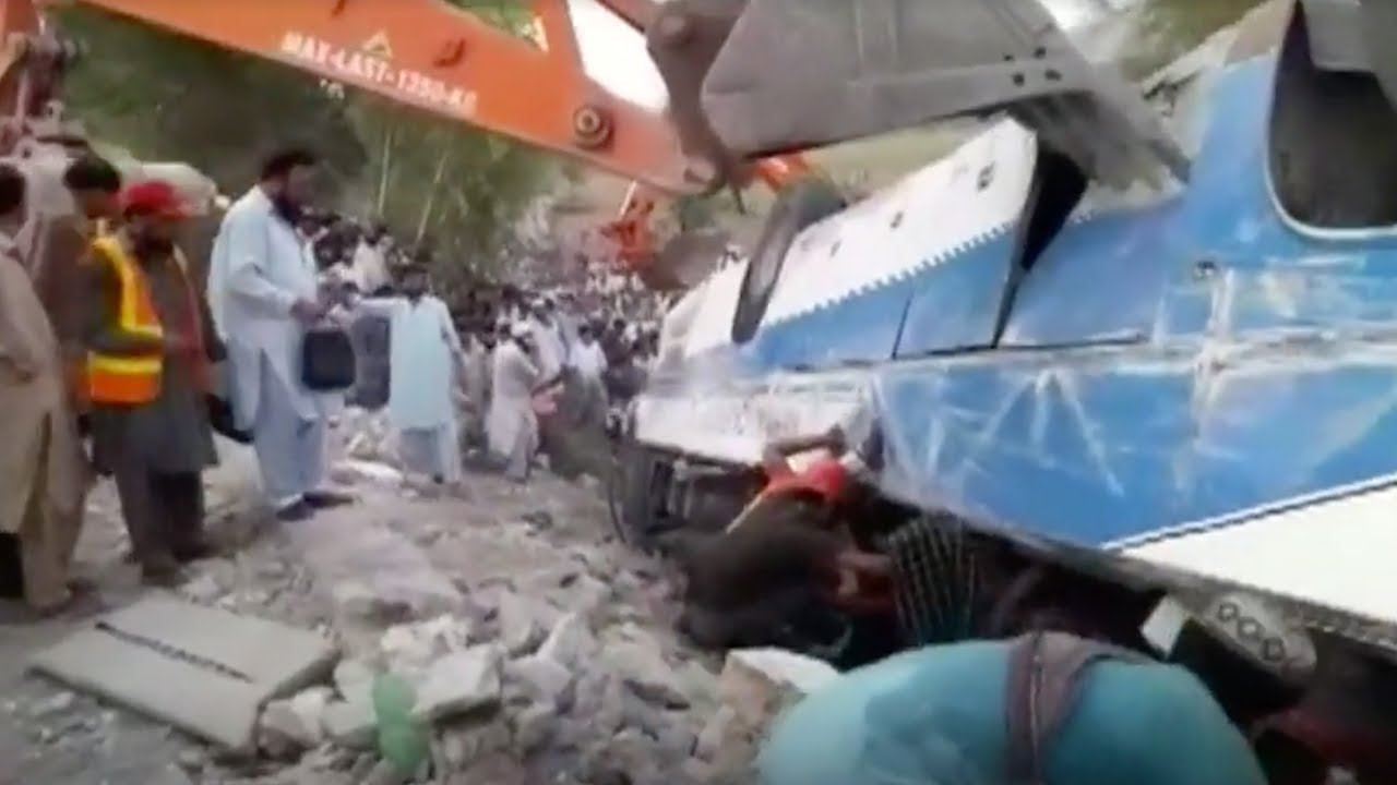 At least 18 killed in Pakistan as bus collides with oil tanker