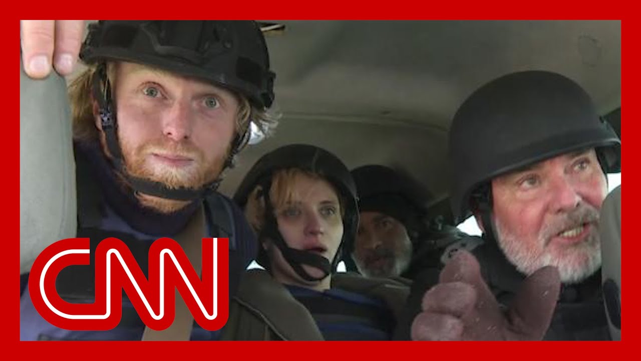 CNN crew has close call with artillery fire
