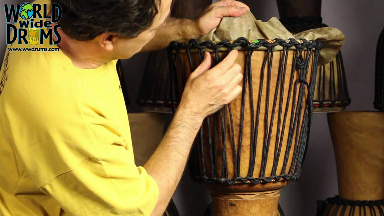 Djembe Repair & Rehead - Positioning Goat Skin on Djembe Drum