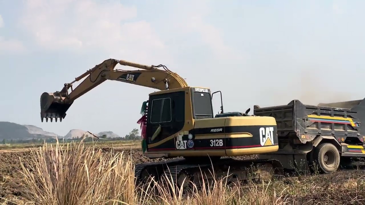 Caterpillar 374D Excavator Loading Massive Mercedes & MAN Trucks
