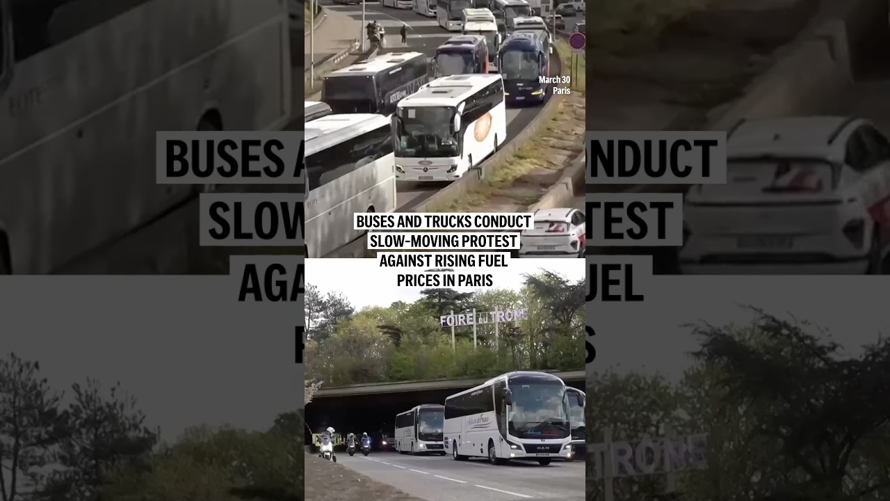 Buses and trucks conduct slow-moving protest against rising fuel prices in Paris