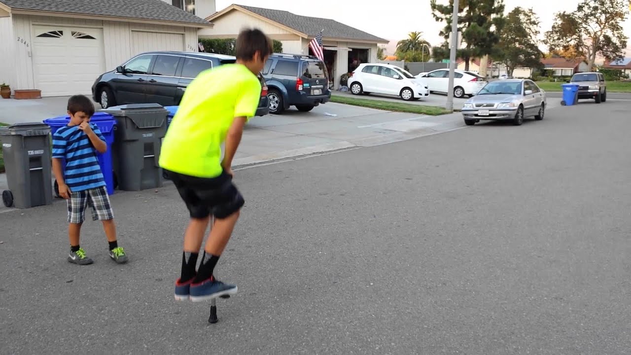 B and Lex on Pogo Sticks