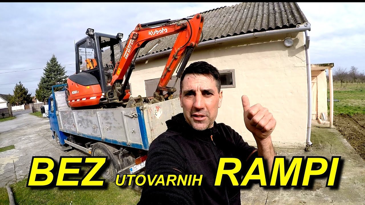 Utovar mini bagera KUBOTA 2.6t na kamion