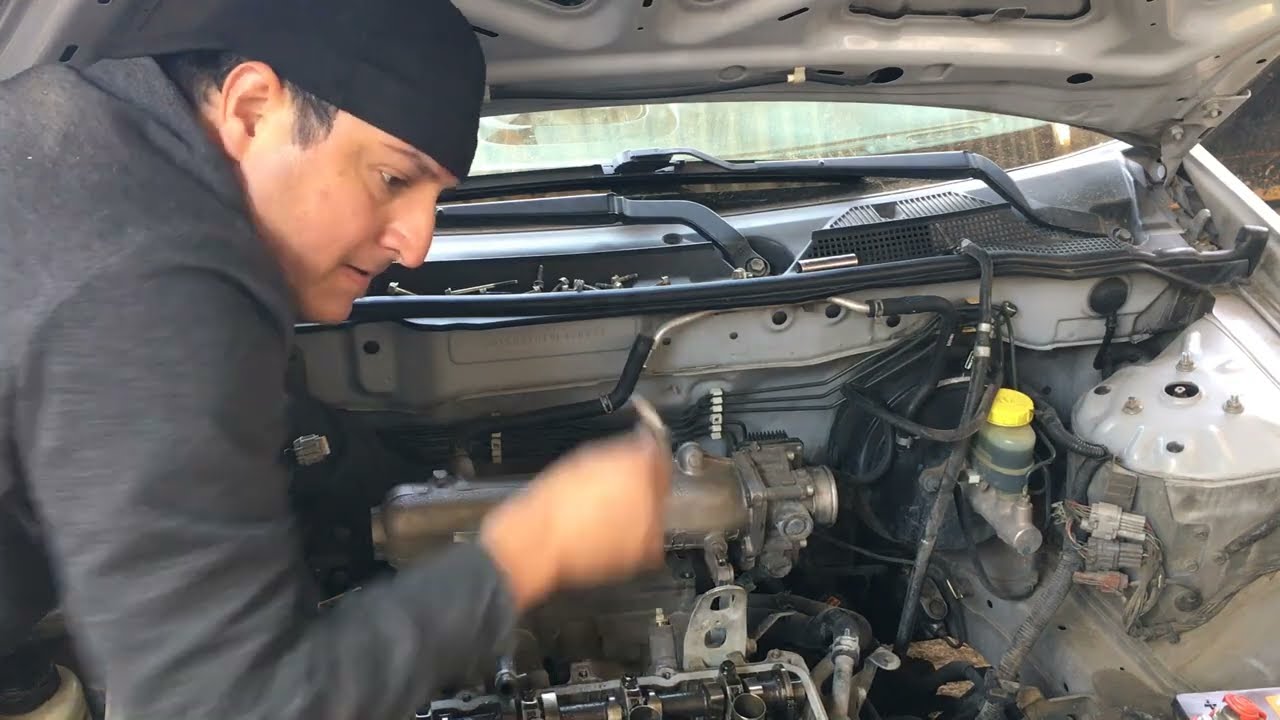 NISSAN sentra modelo 2005 fuga de compresion en el 3er cilindro ve como se reparo!