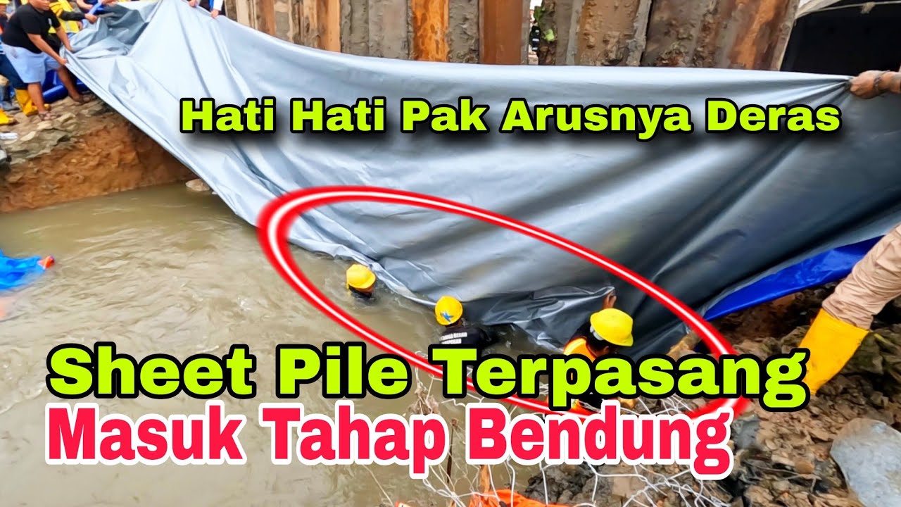 pasang sheet pile baja selesai, kini masuk tahap pengurugan bendung sisi kalimalang yang jebol