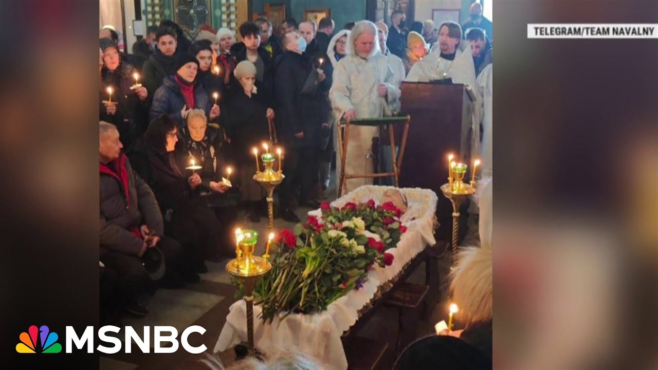 First images of Navalny's casket inside the church