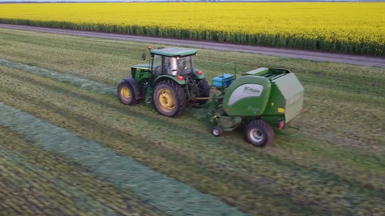 Заготівля сінажу жита в тюках на John Deere та McHale f5400c