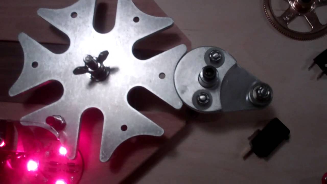 geneva wheel cam gear indexing  running on a gear motor