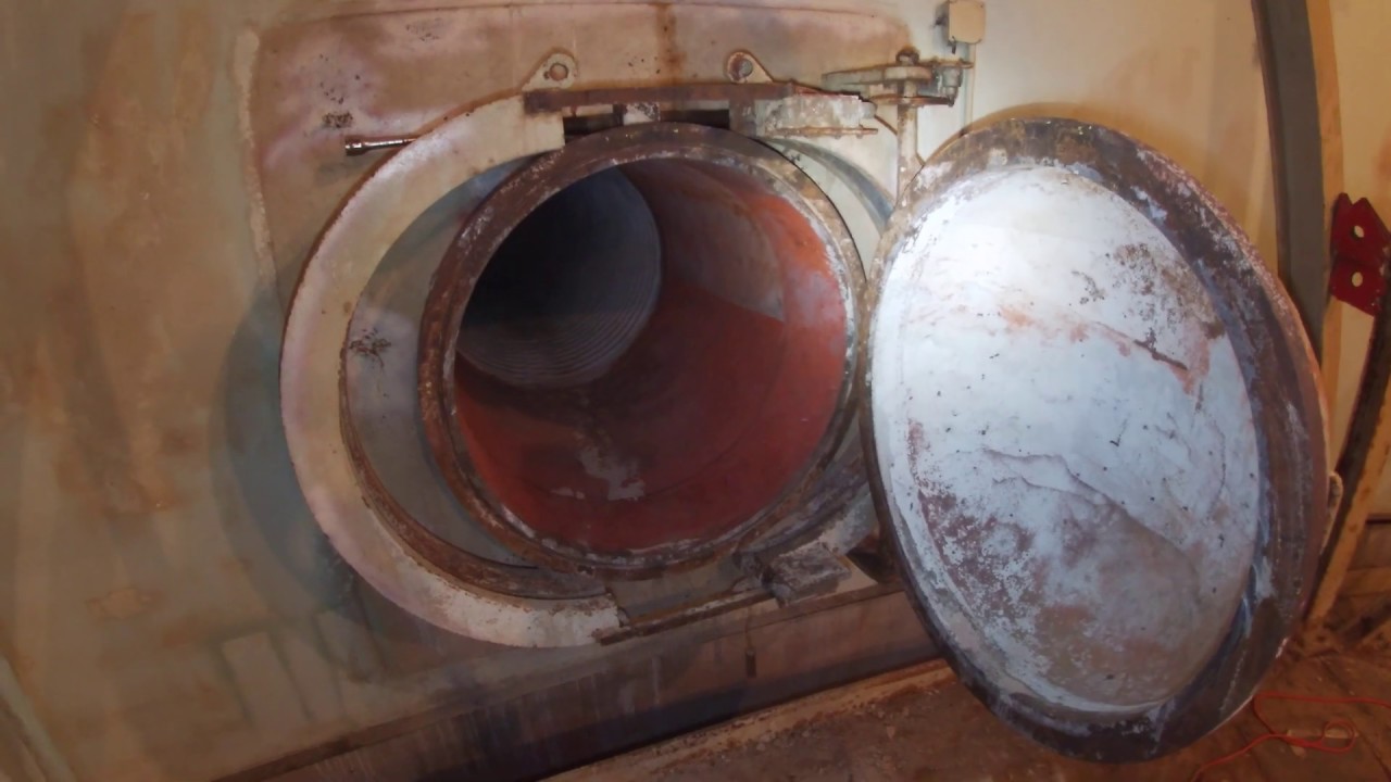 ESCAPE!  Crawling out of a Titan II ICBM Launch Control Center escape shaft.