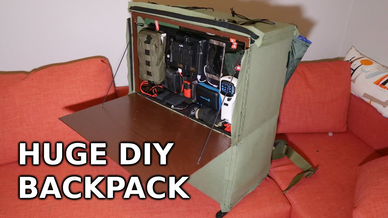 DIY 150L rigid wooden backpack with built-in table and tool board.