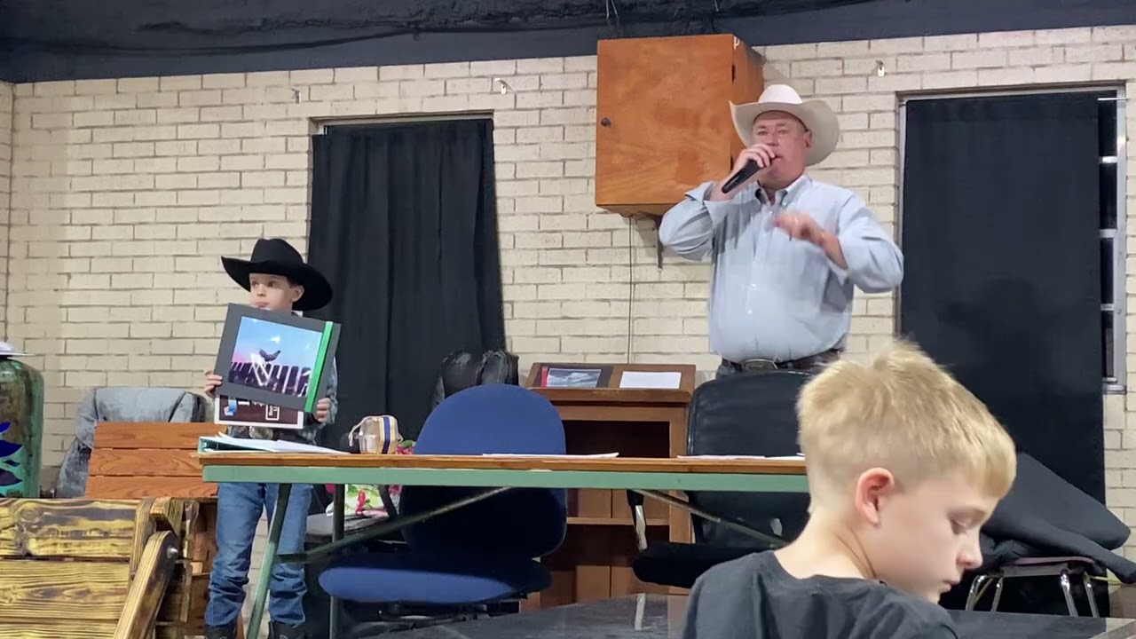 William at Elgin Youth Fair Auction with Jerry the Rooster photograph Jan 2026