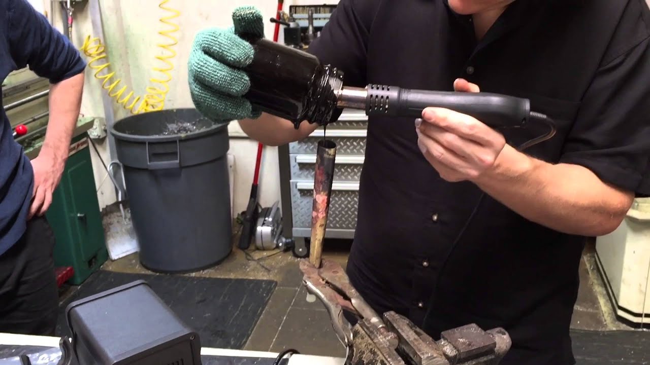 Sax ProShop at MusicMedic bends a saxophone neck