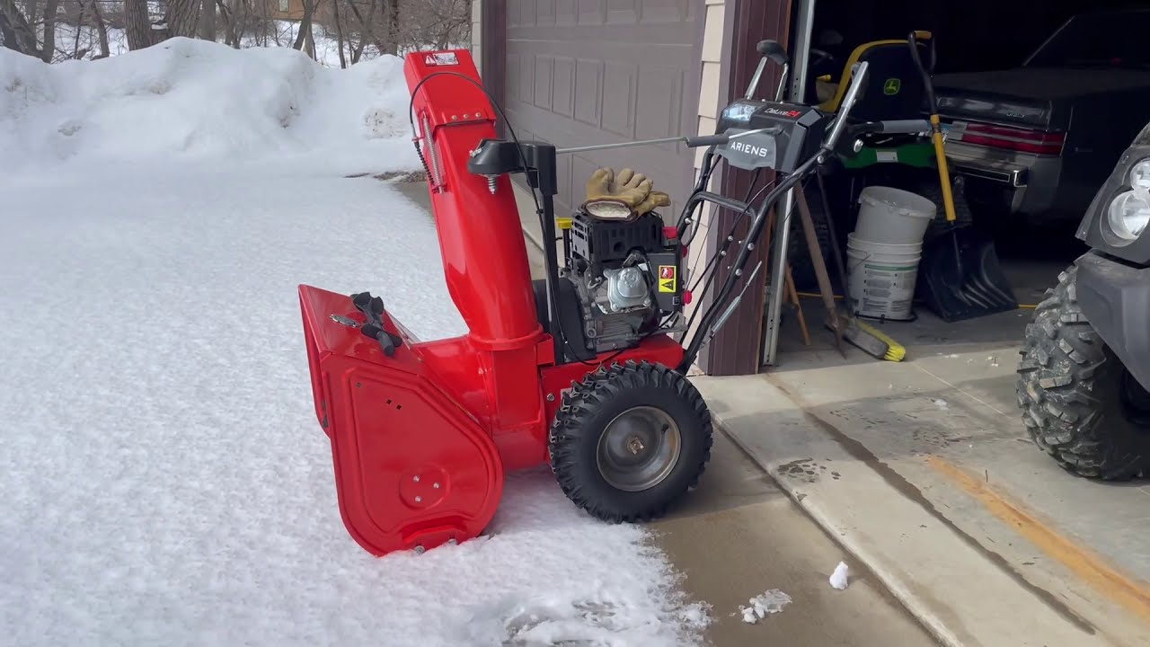 Ariens Deluxe 24 (Tripod Cam)  Melting Heavy Snow @ 50 degrees. Snow Blower Action!