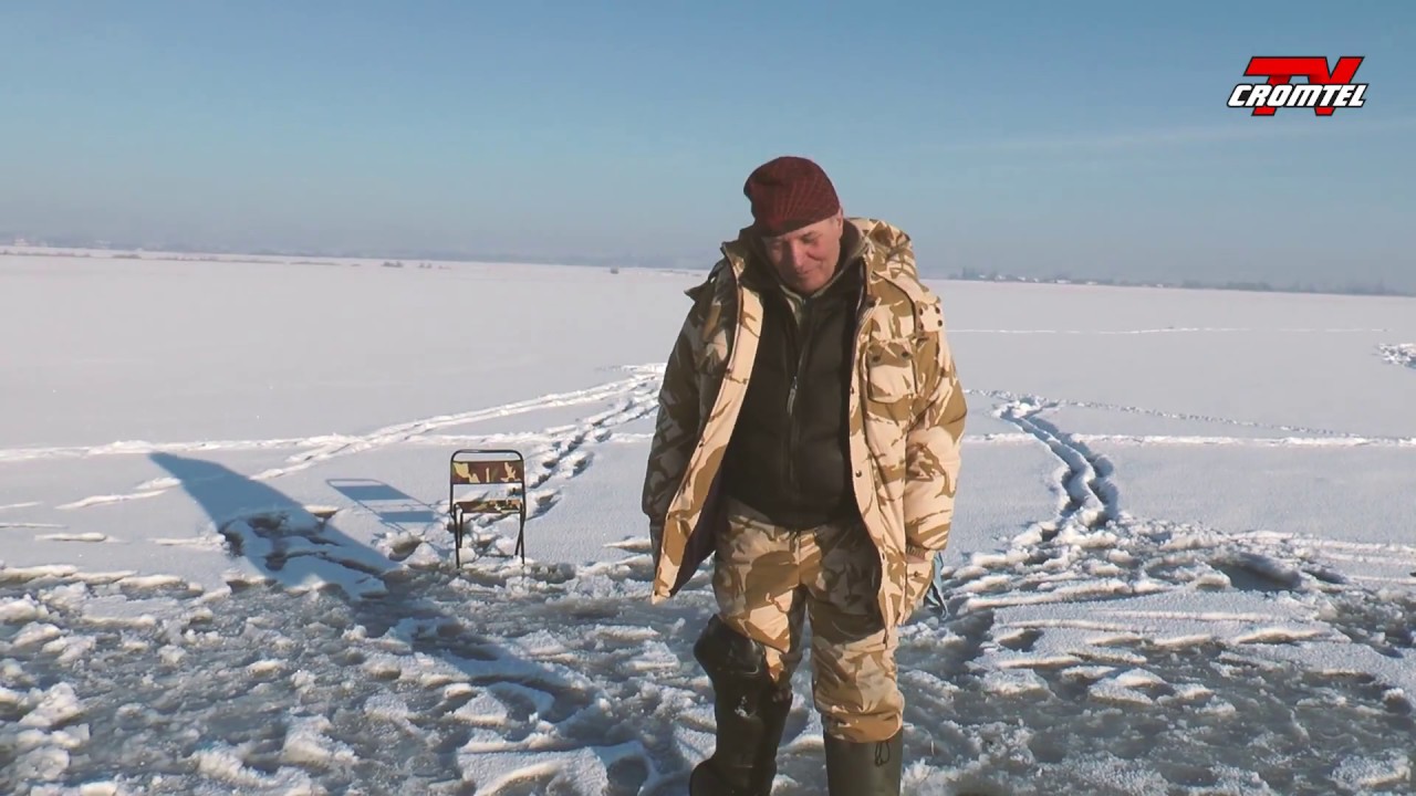 Reportaj - Pescuitul la copca pe Acumularea Rogojesti