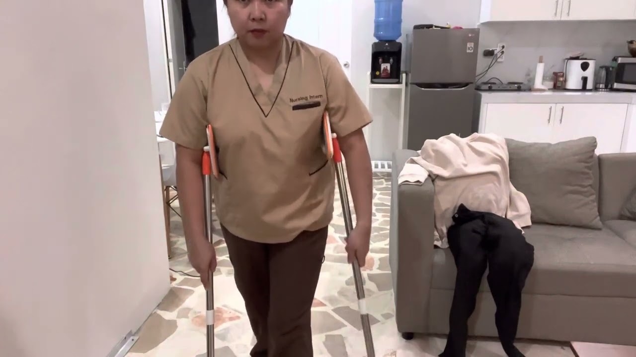 Assisting a patient in ambulating using crutches
